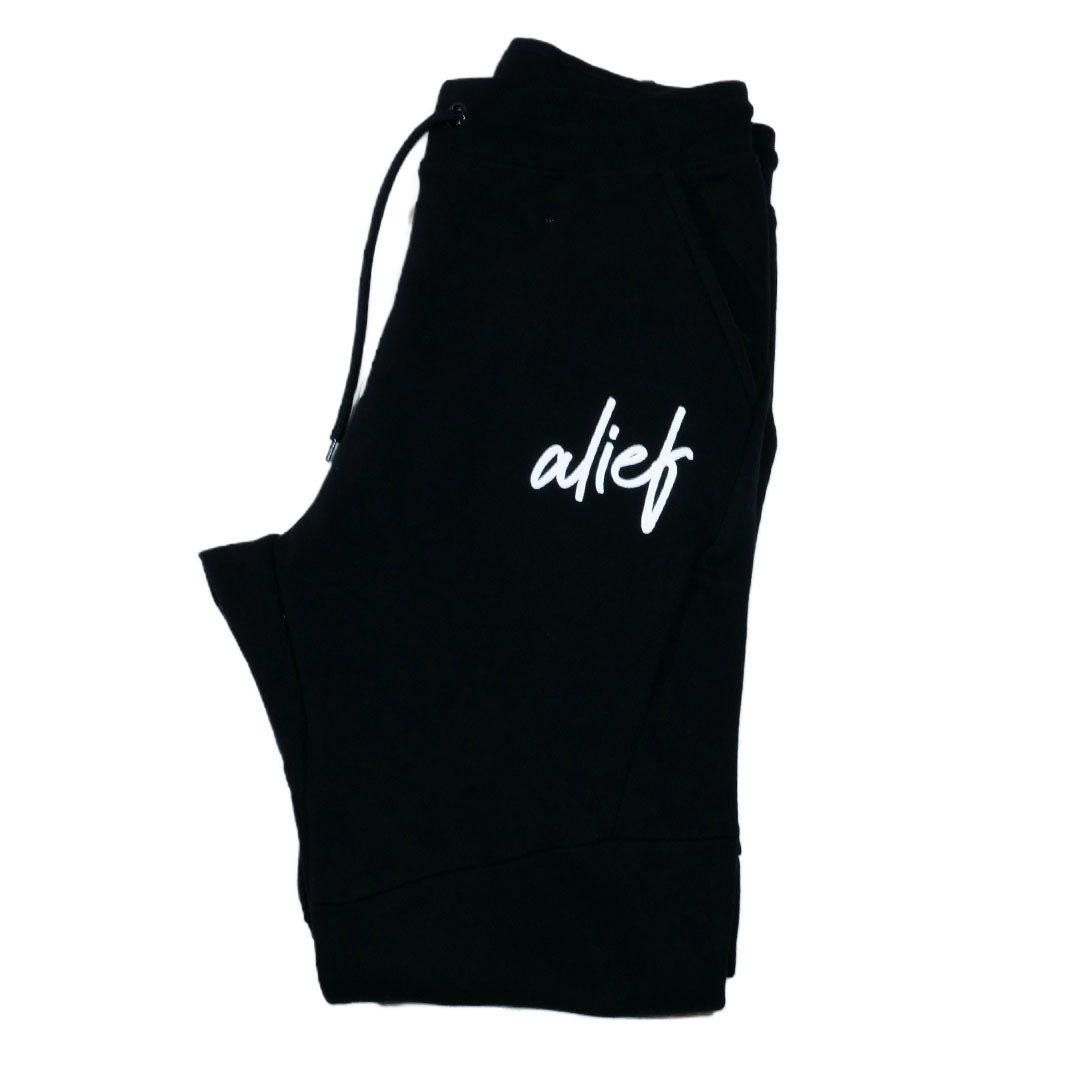 Alief 2.0 Cursive Jumpsuit - Black